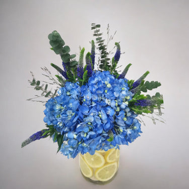 Blue Hydrangea & Veronica Arrangement with Lemon Accents